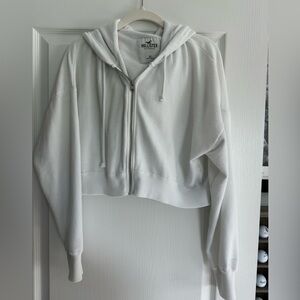 Hollister crop zip up hoodie size xs.
